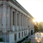 A large building with marble columns at sunset; this is the Doe Library on the UC Berkeley campus.
