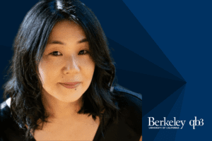 Headshot of Miki Yamamoto on a blue background with the QB3-Berkeley logo in the bottom right corner.
