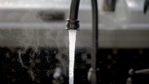Water flowing from a faucet.